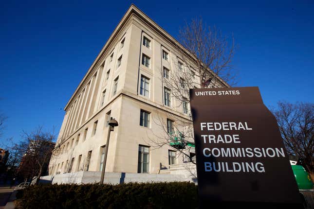 FILE - The Federal Trade Commission building, Jan. 28, 2015, in Washington. Parents whose kids bought virtual gear without their knowledge on the popular Fortnite video game could soon be able to get a refund. The U.S. regulators are starting to notify more than 37 million people by email that they may be eligible for compensation as part of a legal settlement with Fortnite’s maker, Epic Games Inc. (AP Photo/Alex Brandon, File)