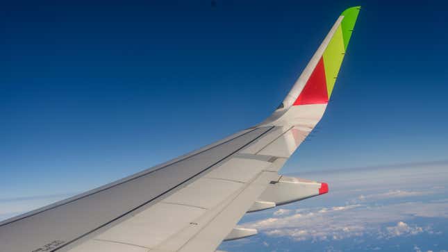 Starboard winglet of a TAP Portugal A321neo after take off from Humberto Delgado International Airport Terminal 1 in the early morning on June 25, 2019 in Lisbon, Portugal.