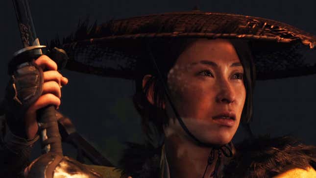 Atsu stares off to her left, readying her sword.