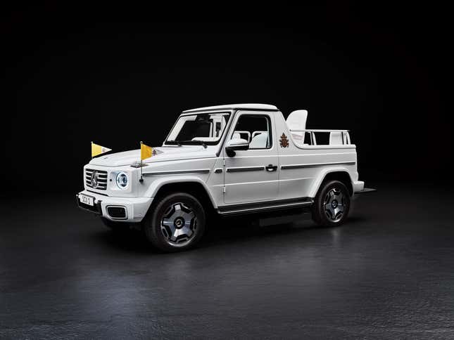 Front 3/4 view of the white Mercedes-Benz G580 Popemobile