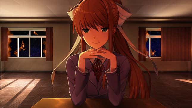Monika sitting at a desk