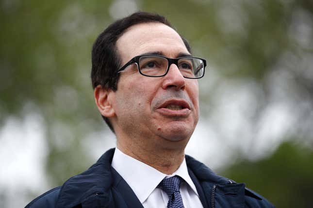 FILE - Former Treasury Secretary Steve Mnuchin speaks with reporters outside the White House, March 29, 2020, in Washington. Mnuchin says he&#39;s going to put together an investor group to buy TikTok, a day after the House of Representatives passed a bill that would ban the popular video app in the U.S. if its China-based owner doesn&#39;t sell its stake.(AP Photo/Patrick Semansky, File)