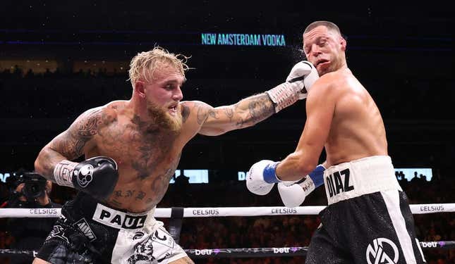 Aug 5, 2023; Dallas, Texas, USA;  Jake Paul (left) fights  against Nate Diaz in a boxing match at American Airlines Center.