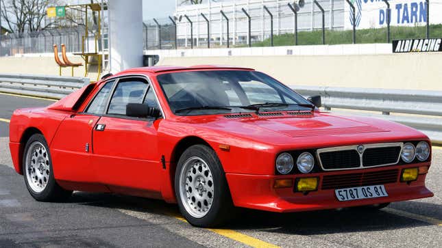 A photo of a red Lancia 037 sports car. 