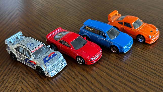 The two cars on the left are part of the more expensive, higher quality Car Culture series; the two on the right are mainlines.