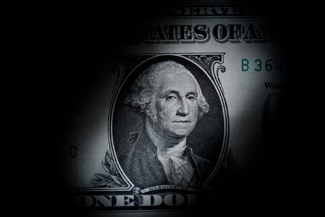 FILE - The likeness of George Washington is seen on a U.S. one dollar bill, March 13, 2023, in Marple Township, Pa. The Congressional Budget Office says it expects the federal budget deficit to drop by $188 billion this fiscal year to $1.5 trillion. But it&#39;s likely to be a short-lived dip as the annual shortfall will likely rise over the next nine years. (AP Photo/Matt Slocum, File)