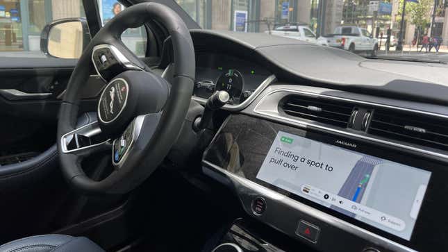 A photo of a self-driving car finding a place to park. 