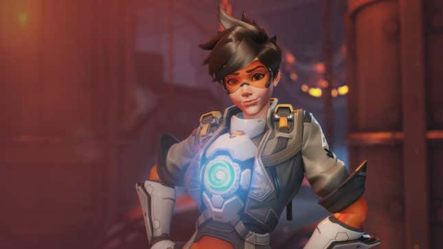 Tracer with her hands on her hips.