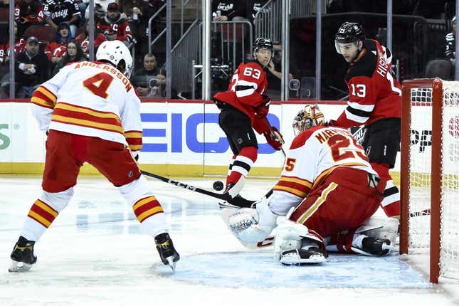 Feb 8, 2024; Newark, New Jersey, USA; Calgary Flames goaltender Jacob Markstrom (25) makes a save against the New Jersey Devils during the second period at Prudential Center.