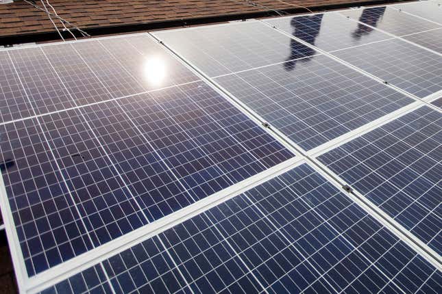 FILE - In a Friday, Aug. 3, 2018 photo, solar panels line the roof of Harmony House as part of a project by Solar Holler in Huntington, W.V. An entire county school system in coal-producing West Virginia is going solar, representing what developer Solar Holler and U.S. Sen. Joe Manchin&#39;s office called Wednesday, Nov. 29, 2023, the largest-ever single demonstration of sun-powered renewable electricity in Appalachian public schools. (Sholten Singer/The Herald-Dispatch via AP, File)