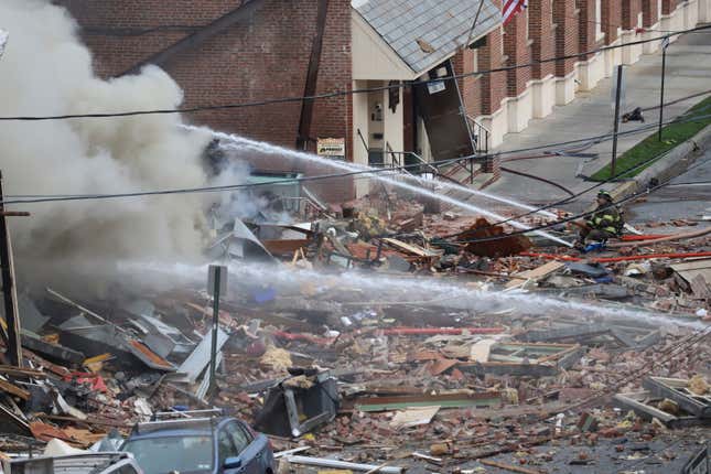 FILE - Emergency personnel work at the site of a deadly explosion at a chocolate factory, March 24, 2023, in West Reading, Pa. Pennsylvania utility regulators must turn over inspection records to the National Transportation Safety Board as part of the federal agency’s probe into a fatal explosion at a chocolate factory last year, a federal judge ruled Tuesday, April 16, 2024. (Jeff Doelp/Reading Eagle via AP, File)