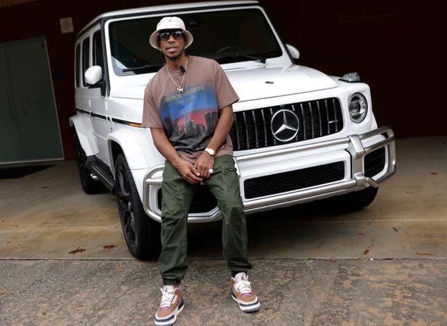 MBUSA brand ambassador and Atlanta rapper Ludacris poses with a Mercedes-Benz.
