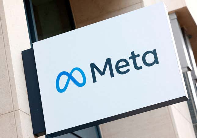 Meta logo on a sign outside a building