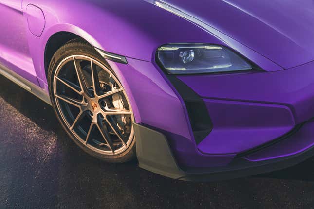 Front bumper and wheel of a purplr Porsche Taycan Turbo GT