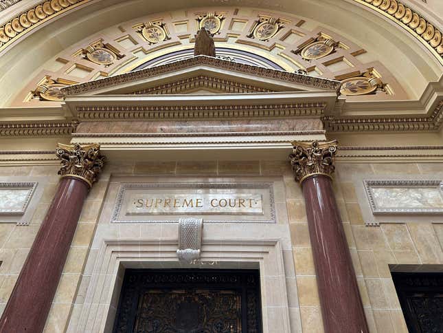 The entrance to the Wisconsin Supreme Court chambers in the state Capitol in Madison, Wis. The court on Thursday, March 14, 2024 ruled that religious exemptions to the state&#39;s unemployment tax don&#39;t apply to a Superior-based Catholic charities ministry. (AP Photo/Todd Richmond)