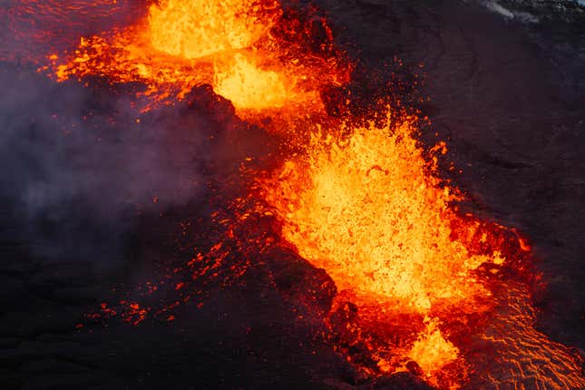 A close up of the Southern active segment of the original fissure of an active volcano in Grindavik on Iceland&#39;s Reykjanes Peninsula, Tuesday, Dec. 19, 2023. (AP Photo/Marco Di Marco)