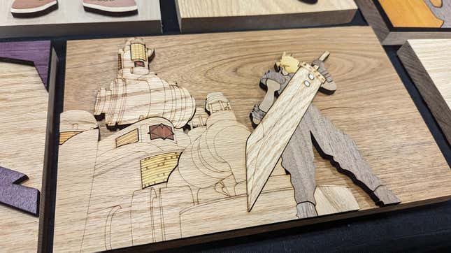 A wood carving of the cover of Final Fantasy VII sits on display.