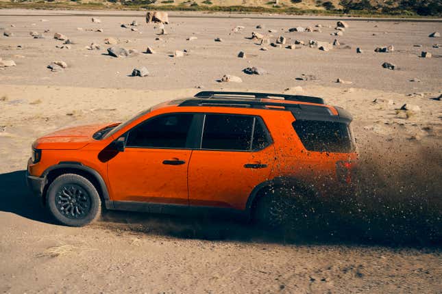 Side view of an orange 2026 Honda Passport TrailSport