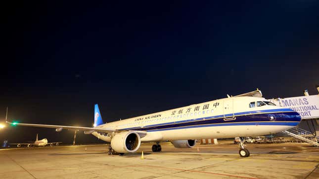 A plane parked at Manas International Airport