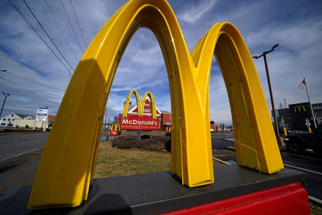 FILE - McDonald&#39;s restaurant signs are shown in in East Palestine, Ohio, Feb. 9, 2023. Krispy Kreme stock jumped Tuesday, March 26, 2024, after it announced a deal where McDonald’s restaurants will sell its doughnuts across the country.(AP Photo/Gene J. Puskar, File)