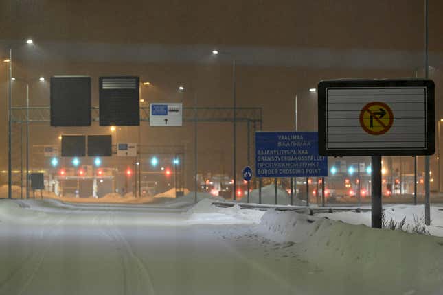 Closed Vaalimaa border check point between Finland and Russia is pictured in Virolahti, Finland, Wednesday Dec. 13, 2023. NATO’s newest member and Russia’s neighbor Finland is to sign a bilateral defense cooperation agreement next week with the United States in a deal that allows Washington to send troops into the Nordic country and to store weapons and equipment there. (Heikki Saukkomaa/Lehtikuva via AP)