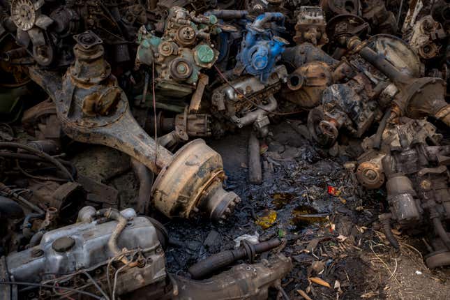 Leaking oil can bee seen over truck parts at a truck scrapyard on June 7, 2018 in Dong Van Village, Yen Lac District, Vinh Phuc Province, Vietnam