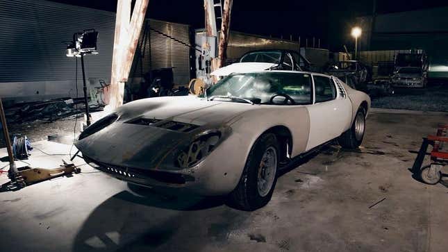 Front 3/4 view of a Lamborghini Miura with mismatched body panels