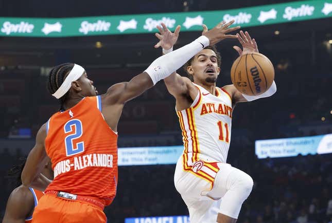 Nov 6, 2023; Oklahoma City, Oklahoma, USA; Oklahoma City Thunder guard Shai Gilgeous-Alexander (2) defends Atlanta Hawks guard Trae Young (11) as he looses control of the ball during the first quarter at Paycom Center.