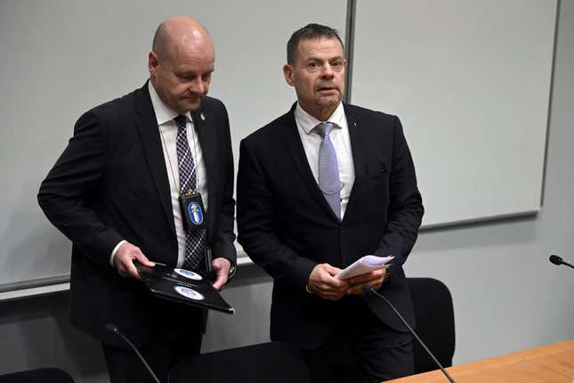 Detective Superintendent Risto Lohi, left, and Director of the National Bureau of Investigation NBI of Finland Robin Lardot attend a press conferance in Vantaa, Finland, Wednesday Oct. 11, 2023. NBI is investigating the Batic connector gas pipeline leak and adjacent data cable damage because of &quot;external activity&quot;. (Jussi Nukari/Lehtikuva via AP)