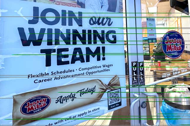 File - A hiring sign is displayed at a restaurant in Mount Prospect, Ill., Dec. 4, 2023. On Thursday, the Labor Department reports on the number of people who applied for unemployment benefits last week. (AP Photo/Nam Y. Huh, File)