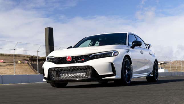 A photo of a white Honda Civic Type R sports car. 