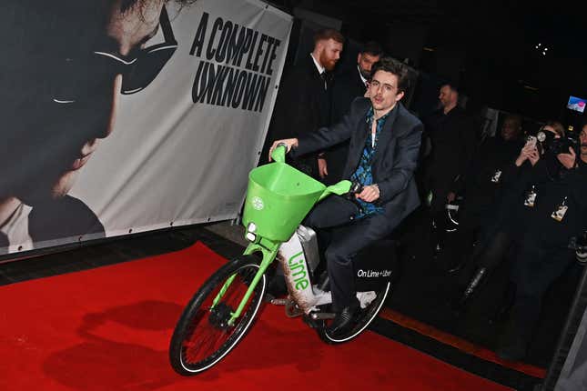 Timothee Chalamet arrives on a Lime Bike to the UK Premiere of "A Complete Unknown" at BFI Southbank on January 14, 2025 in London, England.