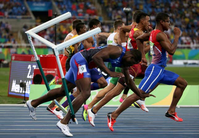 Haiti's Jeffrey Julmis crashes and falls as he competes in the men's 110-meter hurdles semi-final at the Rio 2016 Olympics.