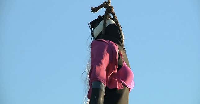Image for article titled This week Trump supporters punched an elderly woman, slapped a protestor, and hung Hillary in effigy