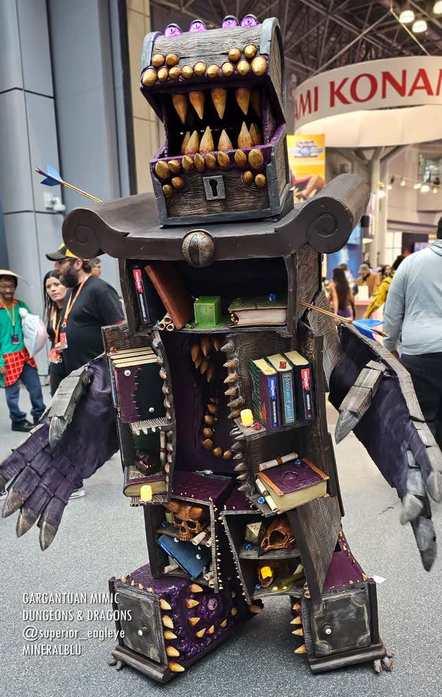 A cosplayer stands dressed as the Gargantuan Mimic from Dungeons & Dragons.
