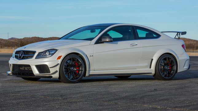 A photo of a white Mercedes C63 AMG Black Series coupe. 