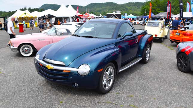 A dark green Chevrolet SSR on display at an auto show