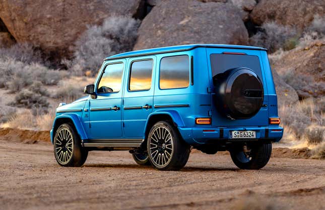 Rear 3/4 view of a Hyper Blue 2025 Mercedes-AMG G63