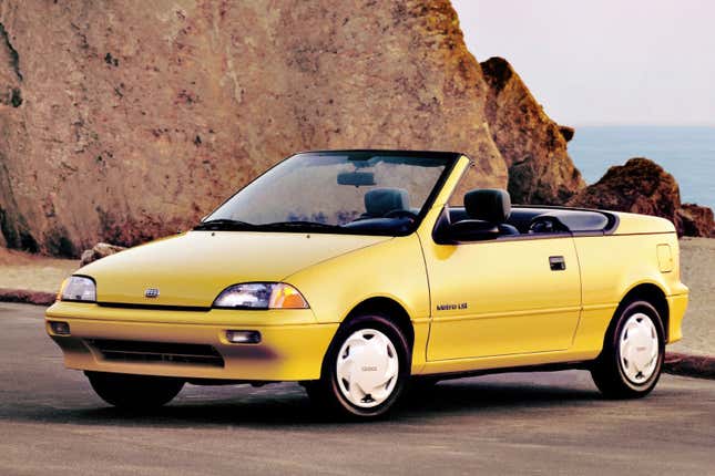 Yellow Geo Metro convertible front-quarter view