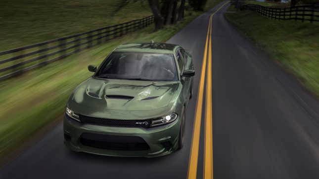 A photo of a green Dodge Charger Hellcat. 