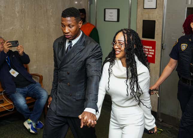 Actor Jonathan Majors and Meagan Good leave the courthouse following closing arguments in Majors’ domestic violence trial at Manhattan Criminal Court on December 15, 2023 in New York City. Majors had plead not guilty but faces up to a year in jail if convicted on misdemeanor charges of assault and harassment of an ex-girlfriend. 