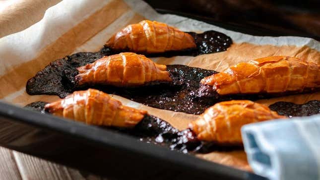 Failed Croissants on tray with filling leaking out