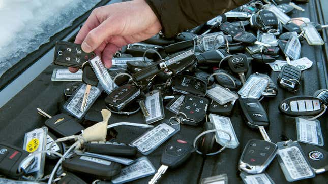 A table covered if sets of car keys 