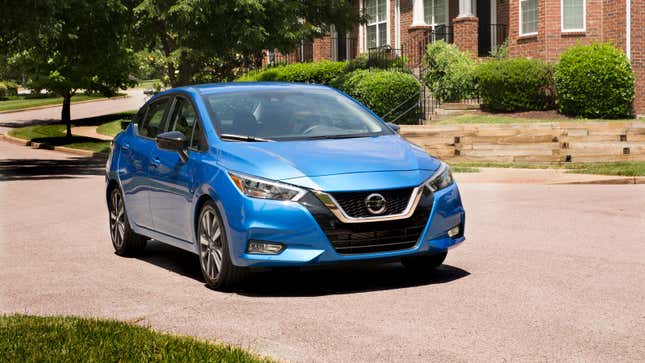 A blue Nissan Versa Sedan