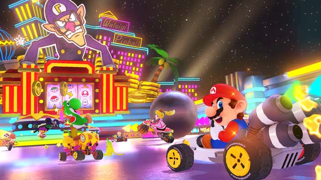 Mario and friends race along the new MK8 stage Waluigi Pinball.