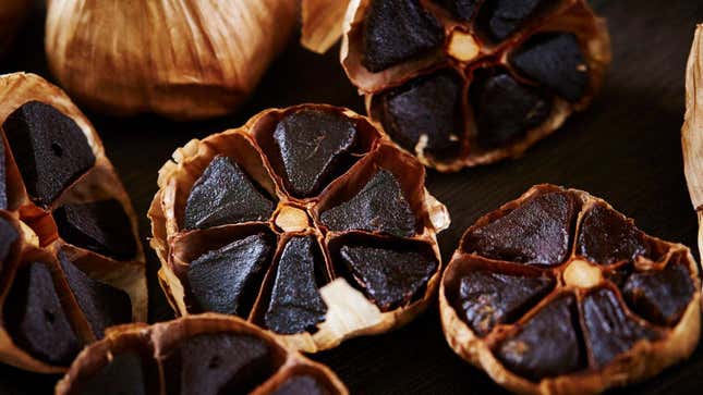 Black garlic bulbs on display.