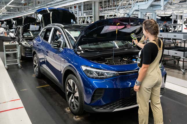 A Volkswagen worker assembles a Volkswagen ID.4 electric SUV in Zwickau, Germany. All of Volkswagen’s plants in the country face cuts.