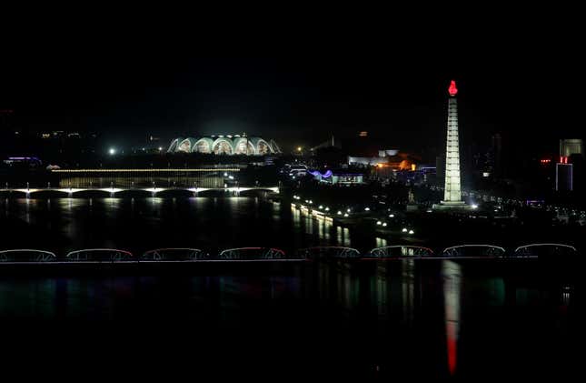 Pyongyang’s Juche Tower and May Day stadium are lit up on the occasion.