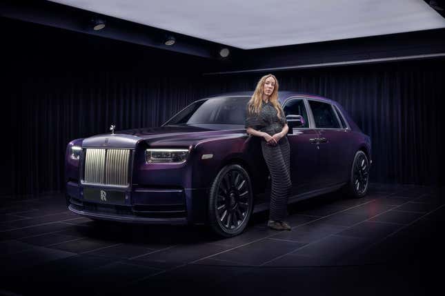 Iris van Herpen posing with the Rolls-Royce Phantom Syntopia