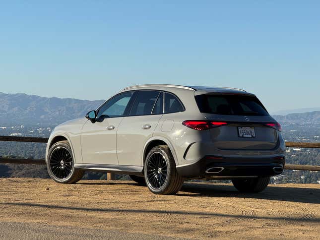 Rear 3/4 view of a grey 2025 Mercedes-Benz GLC350e